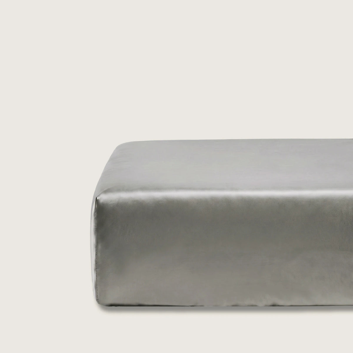 Natural silk fitted sheet Hazel Tussah on a mattress, 100% silk satin, 28 momme, OEKO-TEX certified, made in Germany – SilkWide